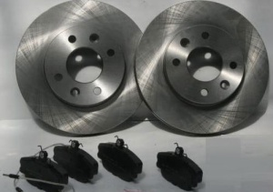 TARCZE+KLOCKI PRZÓD DACIA LOGAN 2004> Z ABS